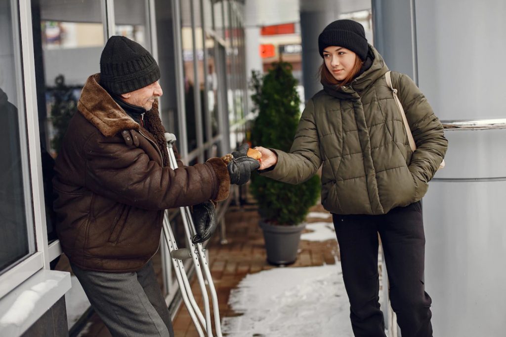 giving food to stranger