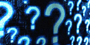 Blue Pixelated Question Marks On A Black Background.jpg